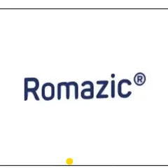 Niebieski napis Romazic® na białym tle. Mała żółta kropka pod napisem.