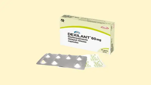 Opakowanie leku Dexilant 60 mg, zawierające 14 kapsułek o opóźnionym uwalnianiu, oraz blister z lekami.